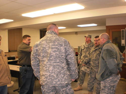 National Guard units being briefed at the Emergency Operations Center