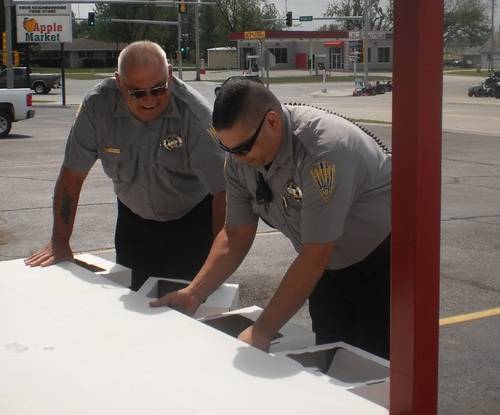 2 deputies setting up a collection site