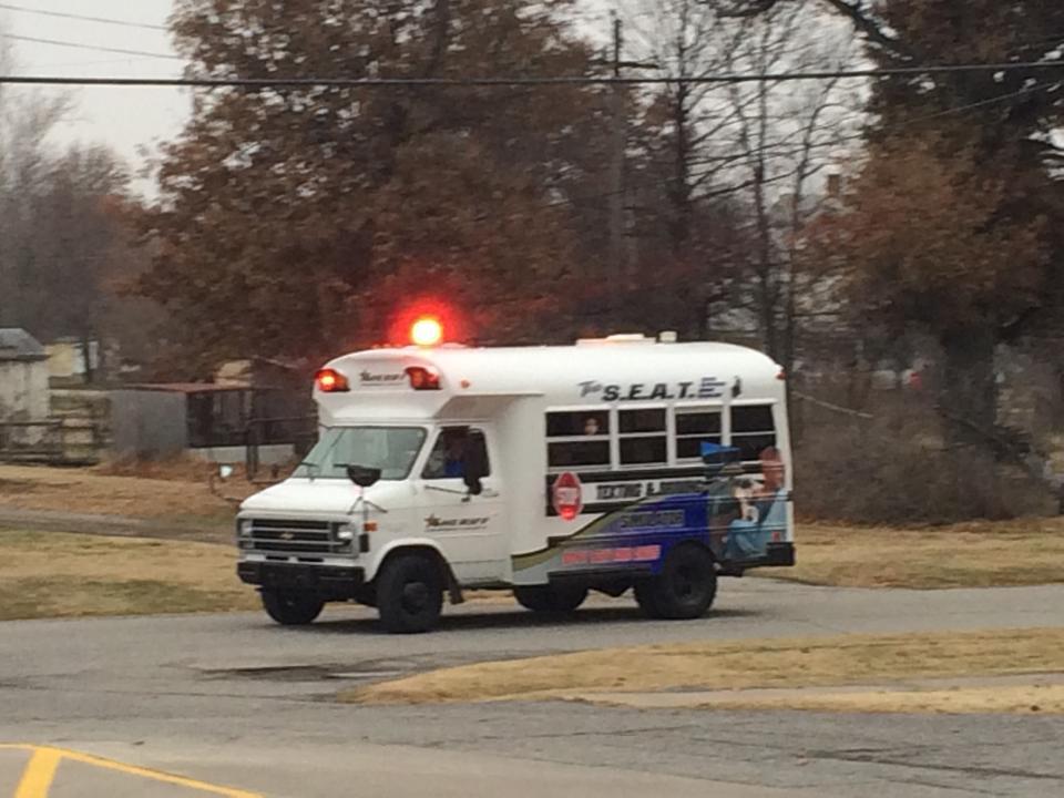 The S.E.A.T. bus driving down the road