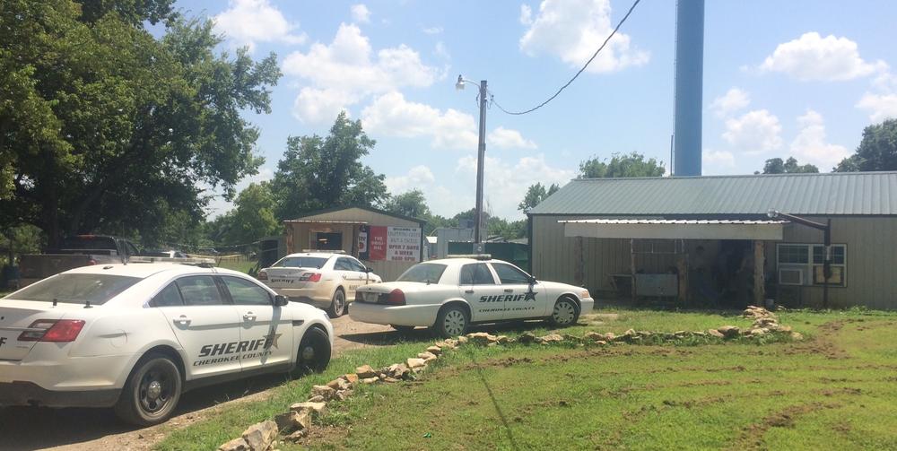 Police vehicles outside residence in Sherman