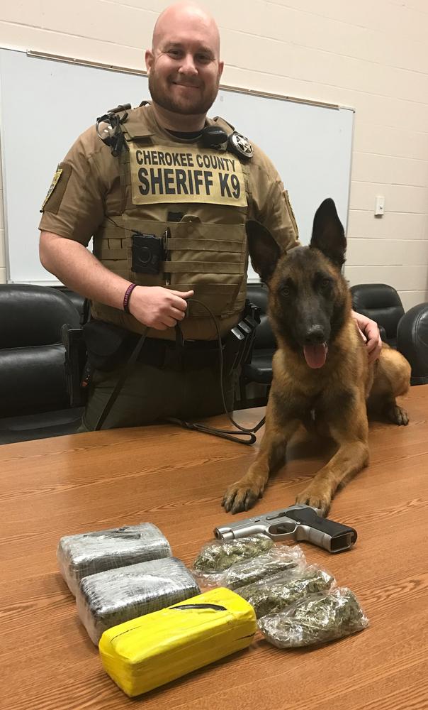 Deputy Wren and Keo with contraband seized