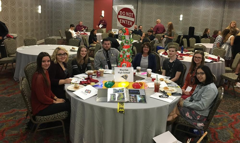 Riverton SAFE Team members sitting at a round table