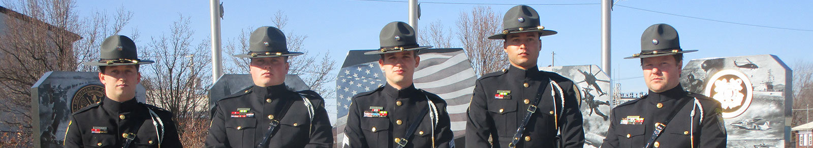 Deputies standing at veteran memorial