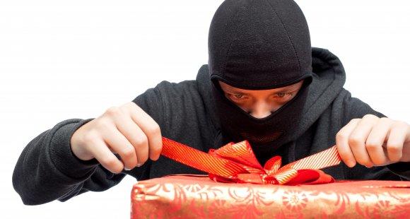 Thief stealing a present