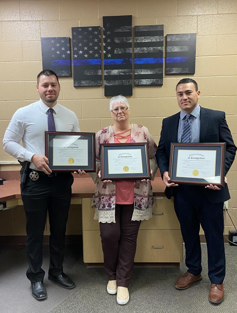  Sgt. Trent Martin, Office Manager Janis Echard and Sgt. Travis Fields